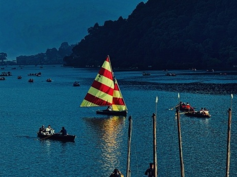 Collage of Nainital attractions including Naini Lake, Naina Devi Temple, and ropeway